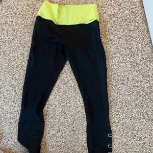 Medium black and neon yellow workout leggings